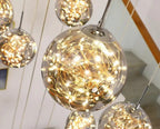 AstraLumen Glass Orb Staircase Chandelier Elevates Stairway Lighting