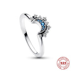 Anillo de Cristal Plateado Lunara con Diseño de Sol y Luna para un Look Celestial Audaz