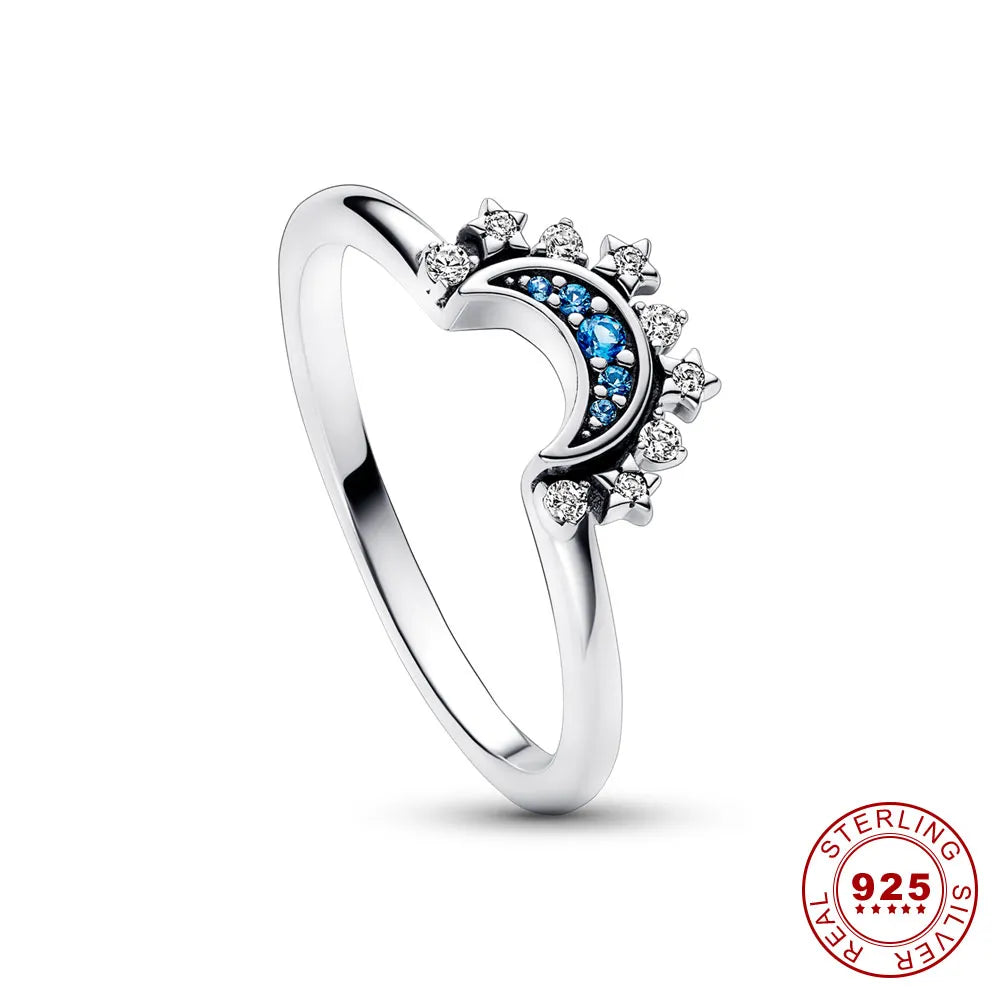 Anillo de Cristal Plateado Lunara con Diseño de Sol y Luna para un Look Celestial Audaz