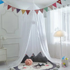 Dosel para cama infantil LumaNest con borlas en blanco, rosa y gris