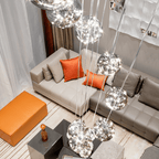AstraLumen Glass Orb Staircase Chandelier Elevates Stairway Lighting