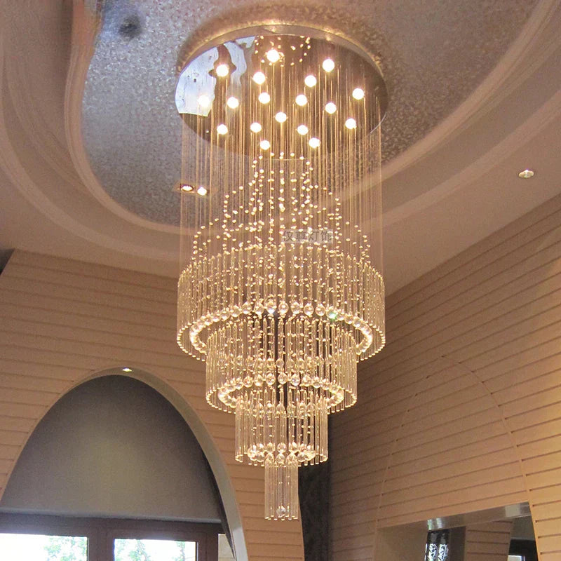 Lampadario Calara con dettagli a goccia di cristallo in acciaio inox
