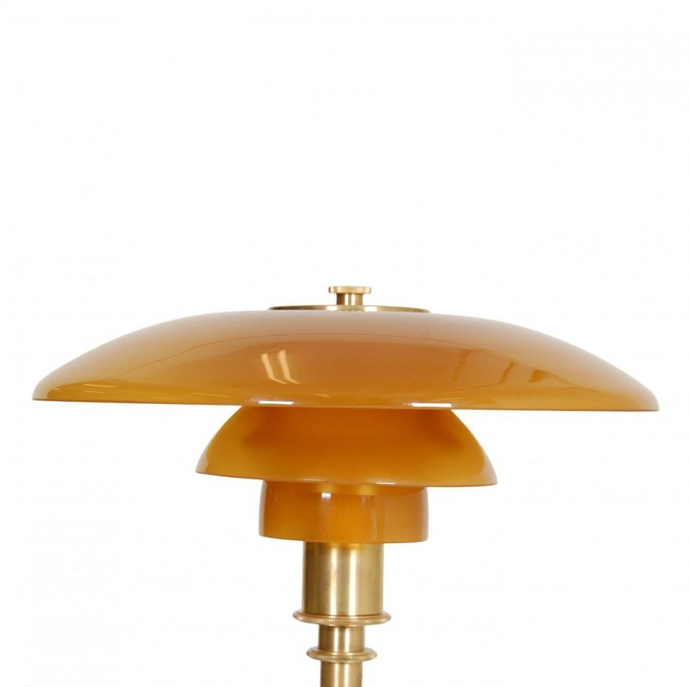 Lampa biurkowa Asterin Art Deco z wyrazistym geometrycznym motywem