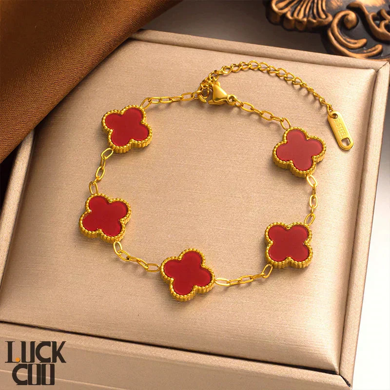 Bracciale Liora Clover con Quattro Ciondoli Floreali in Acciaio Inossidabile Placcato Oro